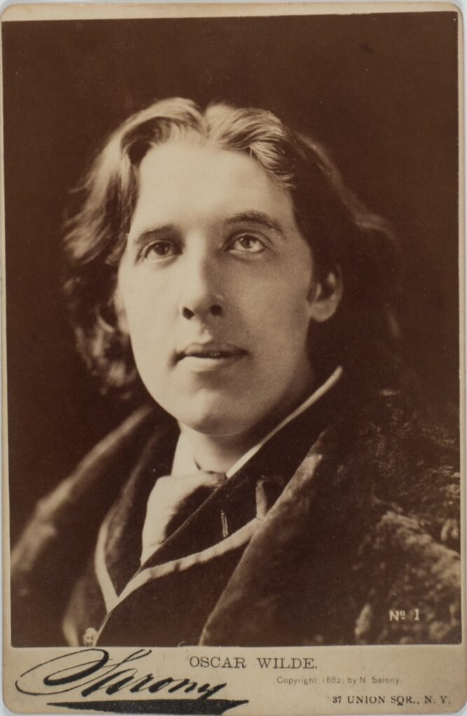 Sepia portrait photograph of Oscar Wilde by Napoleon Sarony, New York, 1882